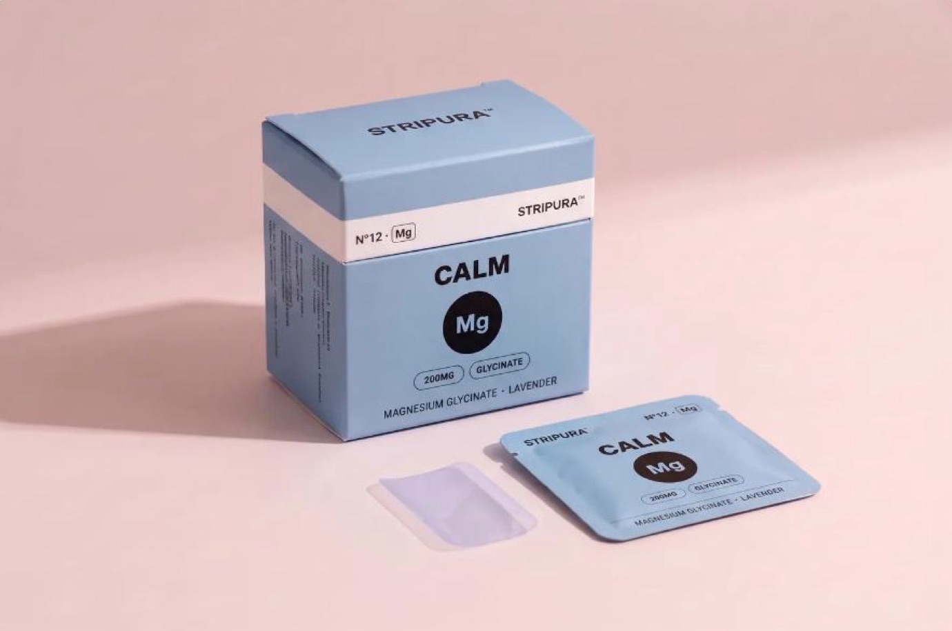 Stripura Calm box in blue with its matte pouch and a translucent strip